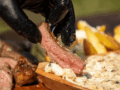 Marble T-Bone Steak with Potato Wedges and Creamy Pepper Sauce